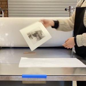 Pulling a print on the press